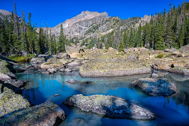 Lake Haiyaha blue milky water Rocky Mountain National Park Tour